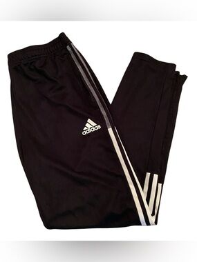 No longer available.  Adidas Youth Black Track Pants with White Side Stripes